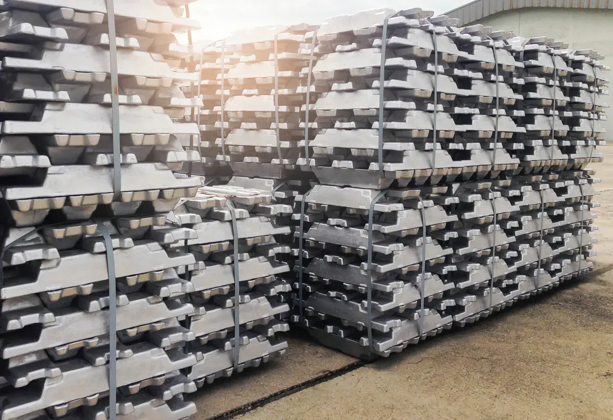 Stacks of aluminium ingots in a warehouse
